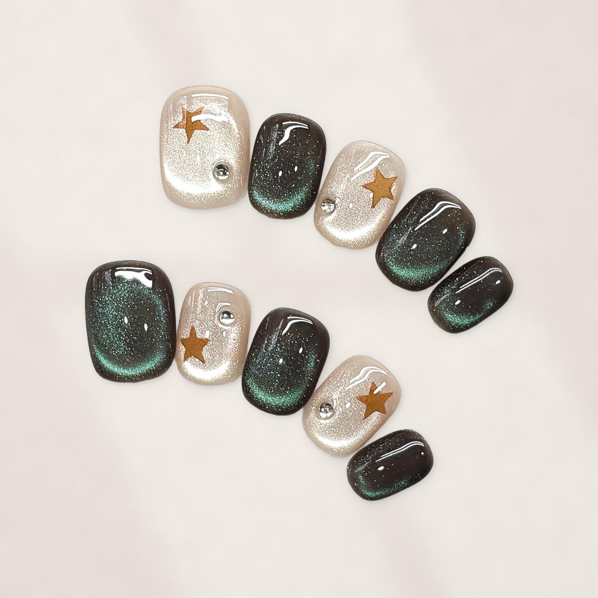 Emerald Moonlight Press-On Nails with Short Rounded Tips, Cat-Eye Glow, Golden Stars, and Pearl Accents 15mm