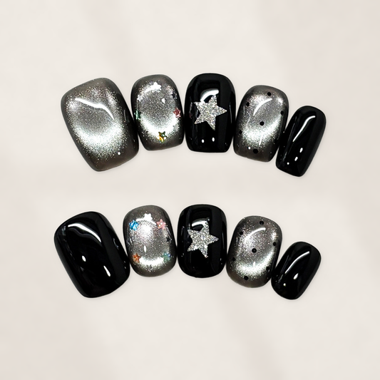 Midnight Starfall Black Cat-Eye Squoval Press-On Nails with Silver Shimmer Charms for Cosmic Glamour 16mm