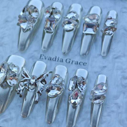 Silver Seraph Nails – Chrome Silver Crystal Press-On Nails with Butterfly & Rhinestone Accents | Luxury Gothic Fairy Nails by Evadia Grace
