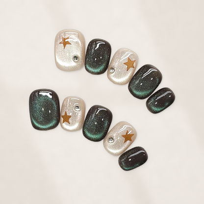 Emerald Moonlight Press-On Nails with Short Rounded Tips, Cat-Eye Glow, Golden Stars, and Pearl Accents  15mm