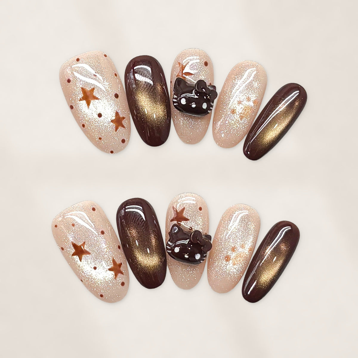 Cocoa Kitty Constellation: Short Squoval Press-On Nails with Nude Glitter, Bronze Stars, and Glossy Cat-Eye Chocolate Accents 20mm