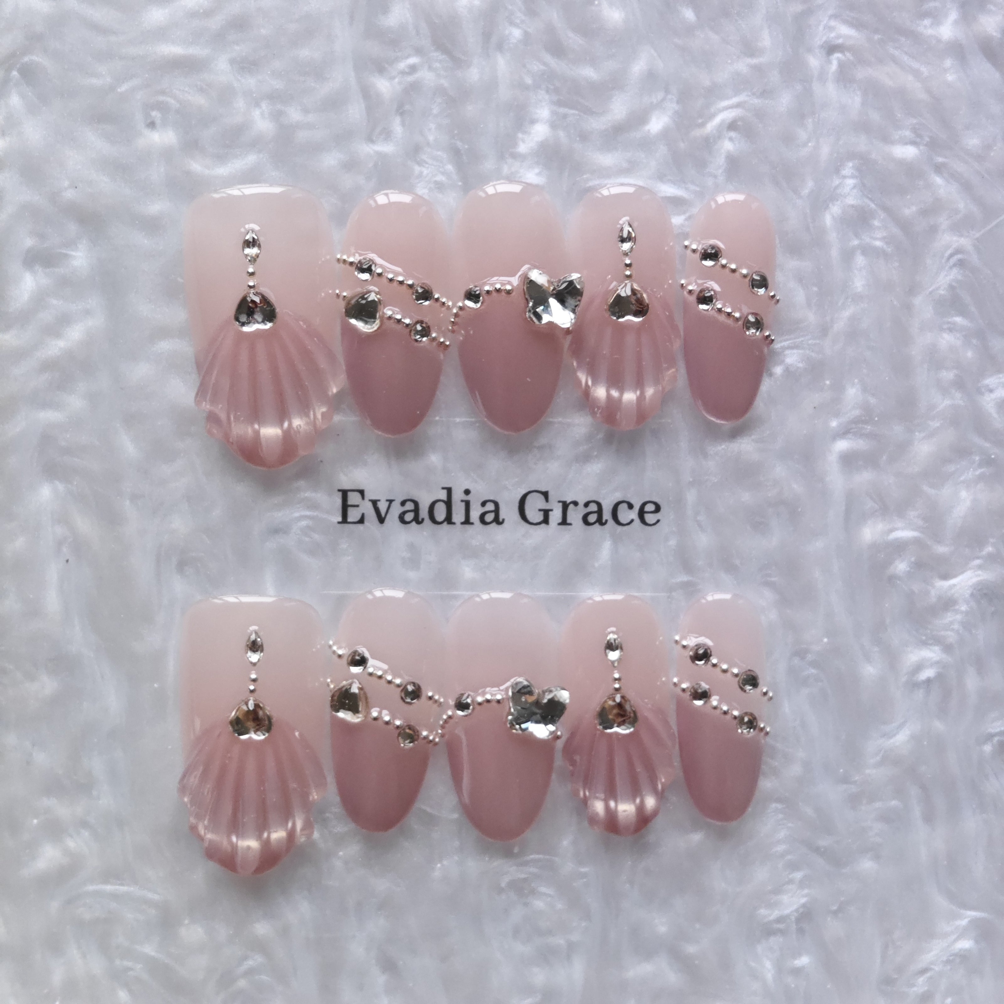 Shell-Inspired Pink Press-On Nails with Faux Diamond & Silver Chain Accents