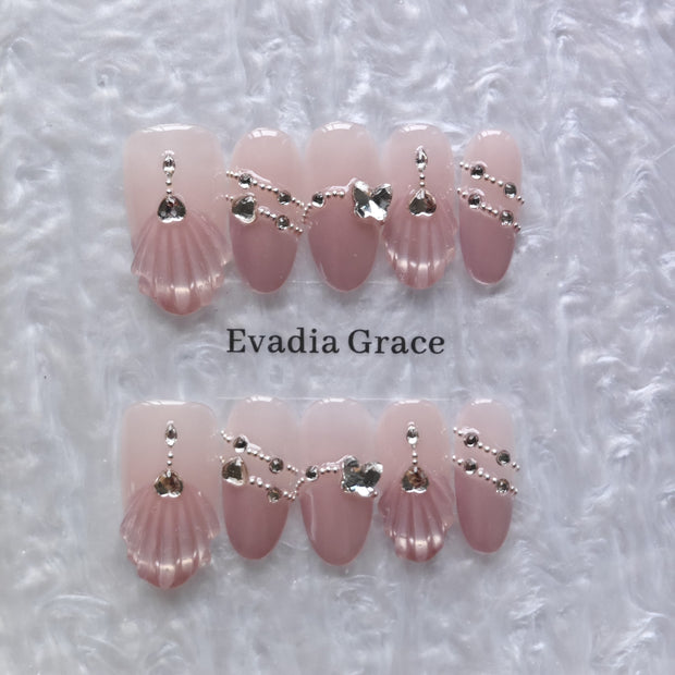 Shell-Inspired Pink Press-On Nails with Faux Diamond & Silver Chain Accents