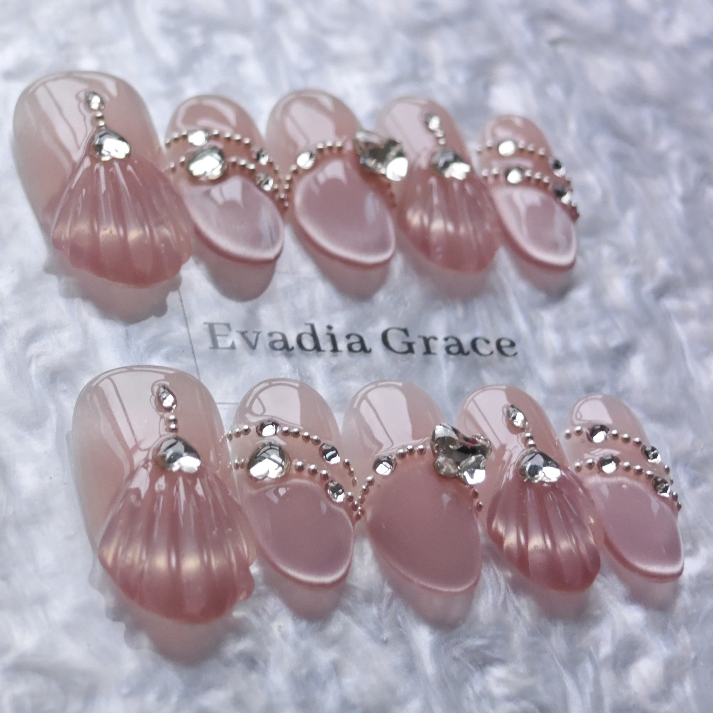 Shell-Inspired Pink Press-On Nails with Faux Diamond & Silver Chain Accents