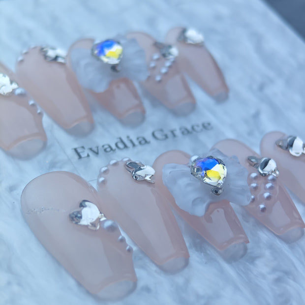 Nude Pink Press-On Nails with White Bows & Heart Crystal Accents
