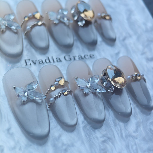 Elegant Butterfly Crystal Press-On Nails with Champagne Gemstone