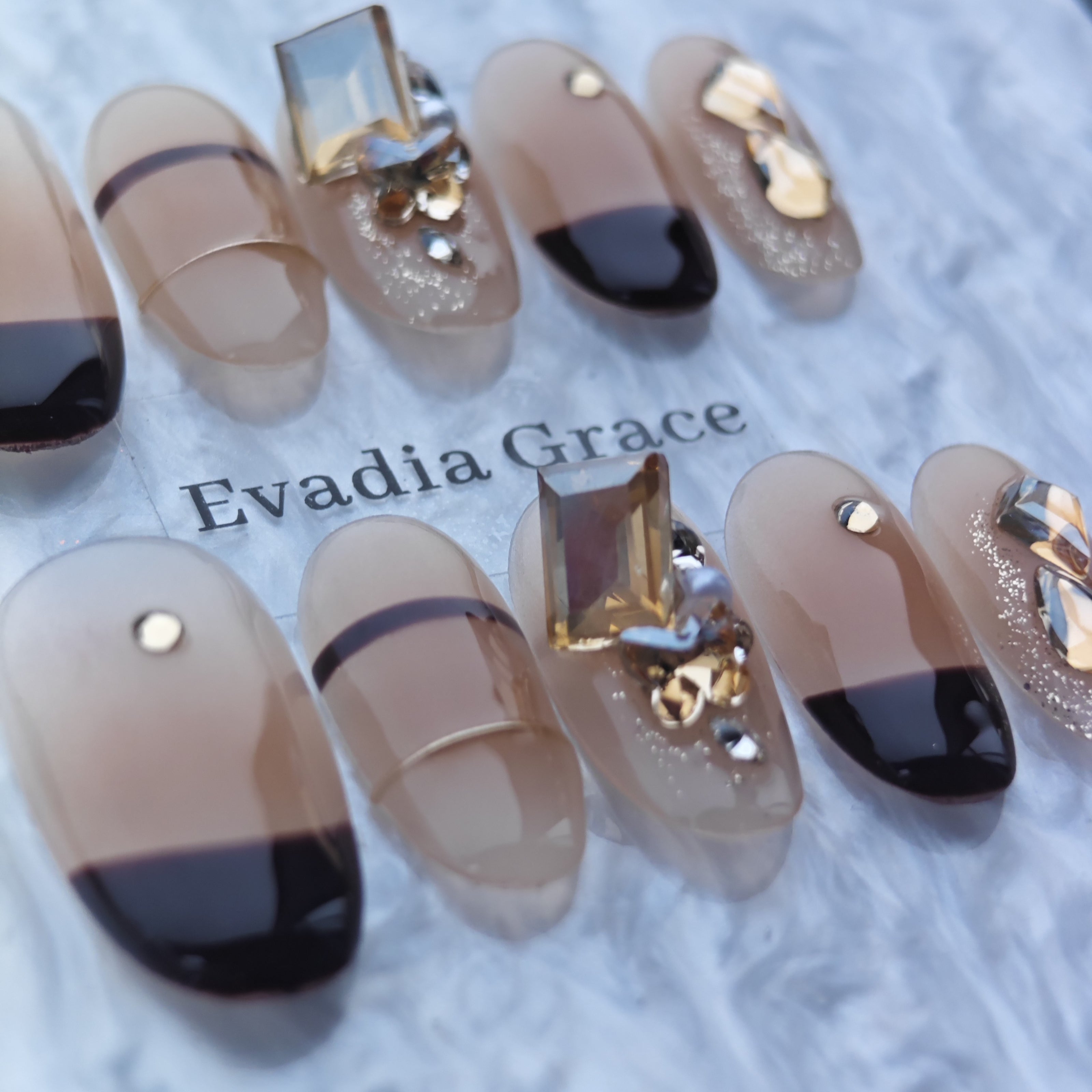 Chic Nude & Black French Tip Press-On Nails with Gold Gem Accents