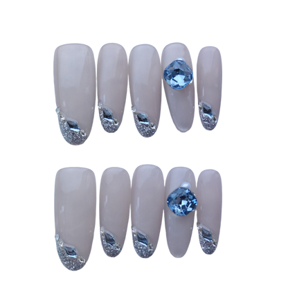 Elegant Nude Press-On Nails with Silver Glitter & Blue Gem Accents