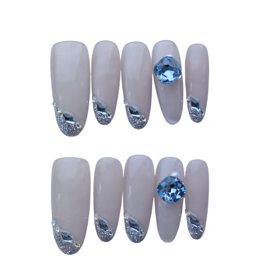 Elegant Nude Press-On Nails with Silver Glitter & Blue Gem Accents