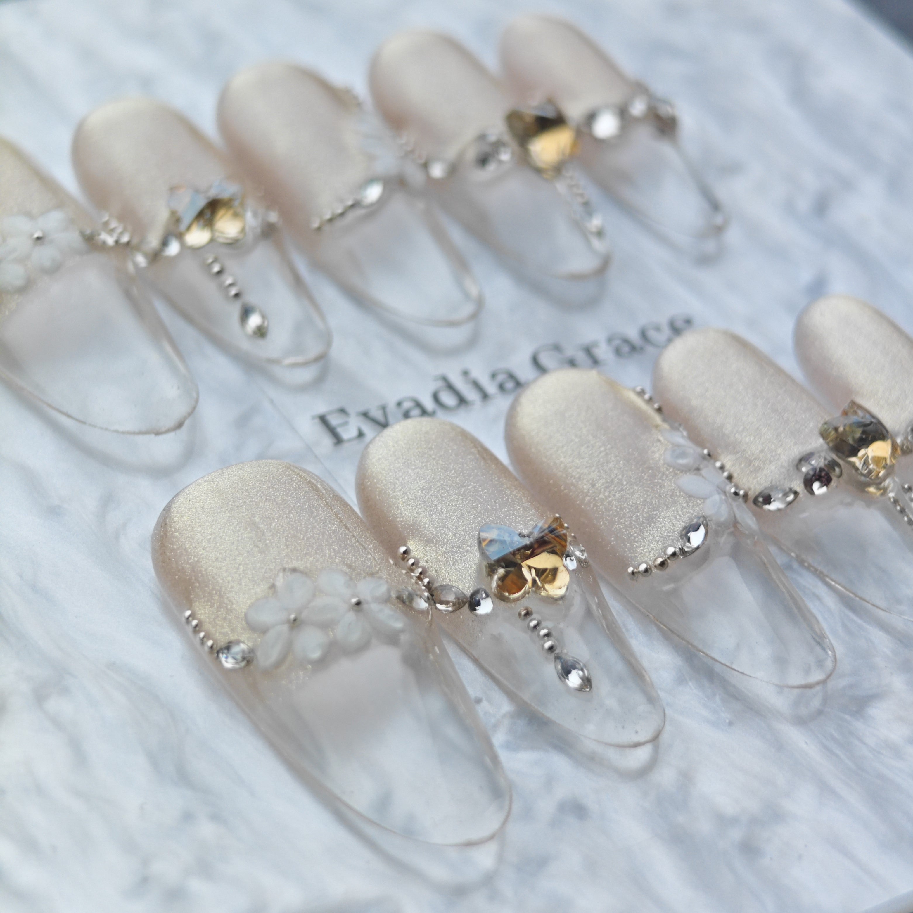 Elegant Champagne Glitter Press-On Nails – 3D White Flower & Crystal Accents | Long Clear Tip False Nails | Reusable Luxury Nail Art