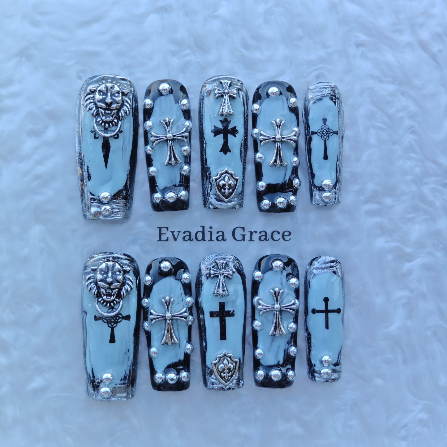 Frosted Gothic Crest Nails – Ice Blue Chrome with 3D Crosses, Lion Emblem & Shield Accents | Luxury Press-On Nails