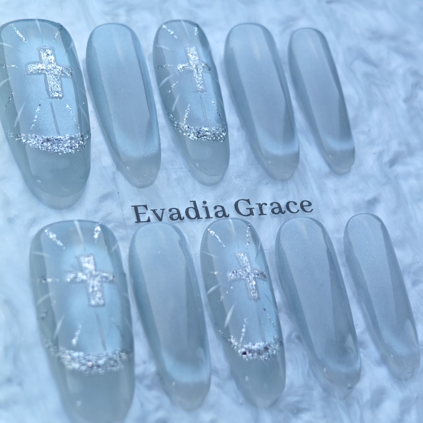 Ice Silver Cross Nails – Frosted White Glazed Press-On Nails with Glitter Halo & Holy Light Design | Evadia Grace