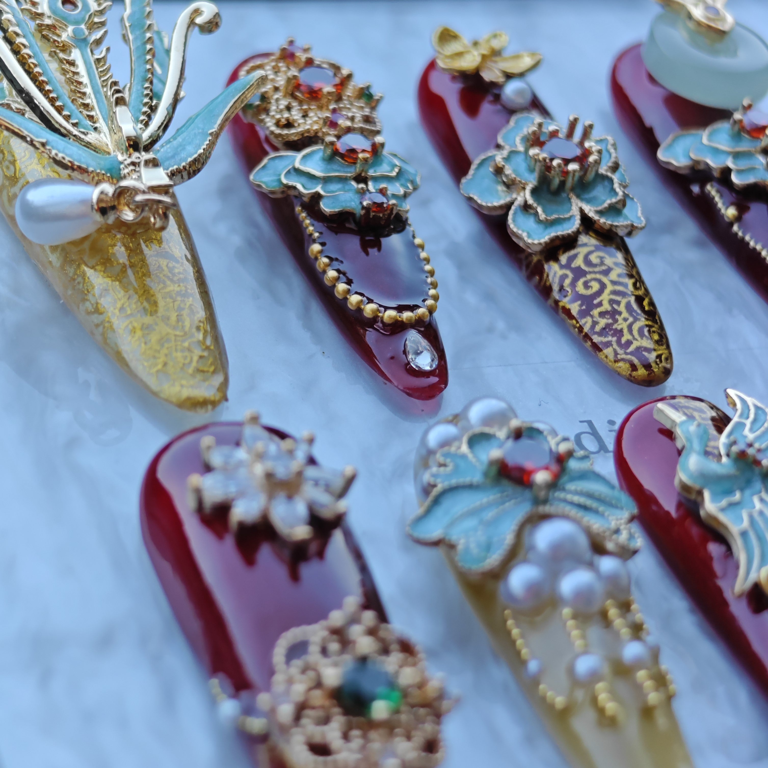 Imperial Phoenix Nails – Red & Gold Palace Press-On Nails with Enamel Blossoms and Pearl Charms | Luxury Chinese Royal Court Nails by Evadia Grace