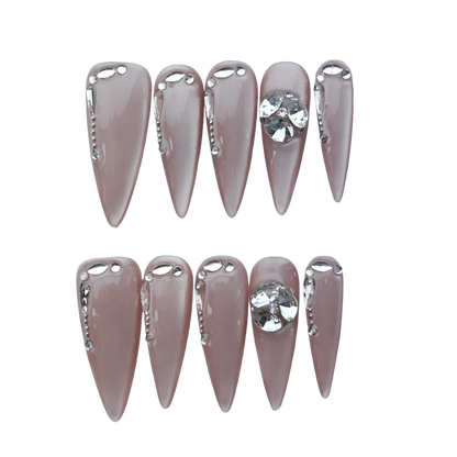 Nude Chrome Drip Nails – Silver Liquid Metal Accent with Crystal Gem
