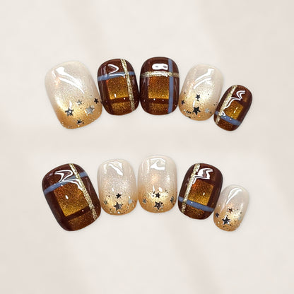 Espresso Starlit Press-On Nails with Short Squoval Tips, Golden Cat-Eye Plaid Panels, and Celestial Star Accents  15mm
