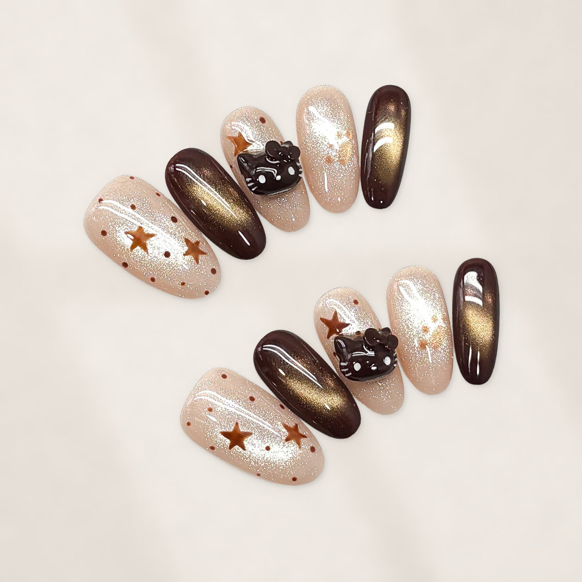 Cocoa Kitty Constellation: Short Squoval Press-On Nails with Nude Glitter, Bronze Stars, and Glossy Cat-Eye Chocolate Accents 20mm