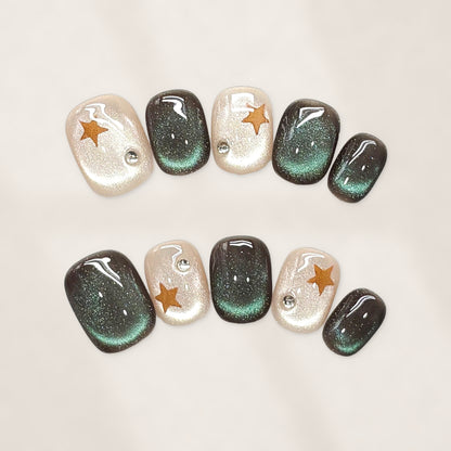 Emerald Moonlight Press-On Nails with Short Rounded Tips, Cat-Eye Glow, Golden Stars, and Pearl Accents  15mm