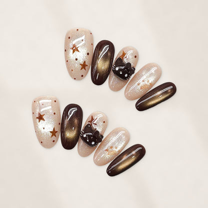 Cocoa Kitty Constellation: Short Squoval Press-On Nails with Nude Glitter, Bronze Stars, and Glossy Cat-Eye Chocolate Accents 20mm